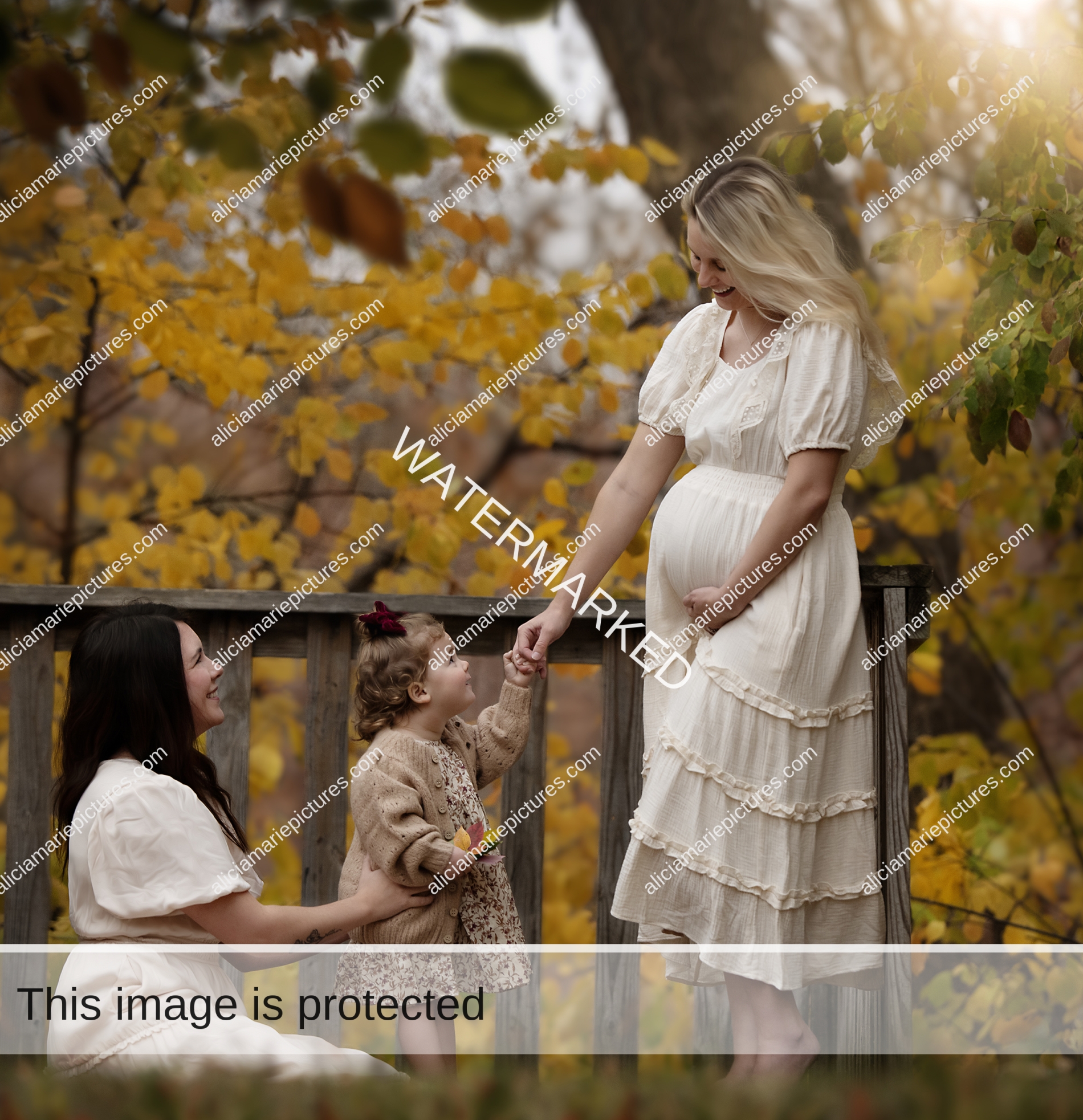 Two mothers with their daughter. Autumn vibrant fall colors. Fine art photography Fargo North Dakota